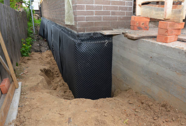 Happy homeowners after waterproofing job in Rosholt